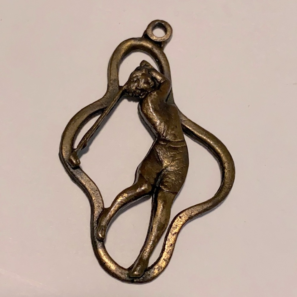 Vintage woman’s Golfing pendant